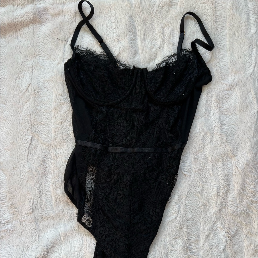 3 different black bodysuits